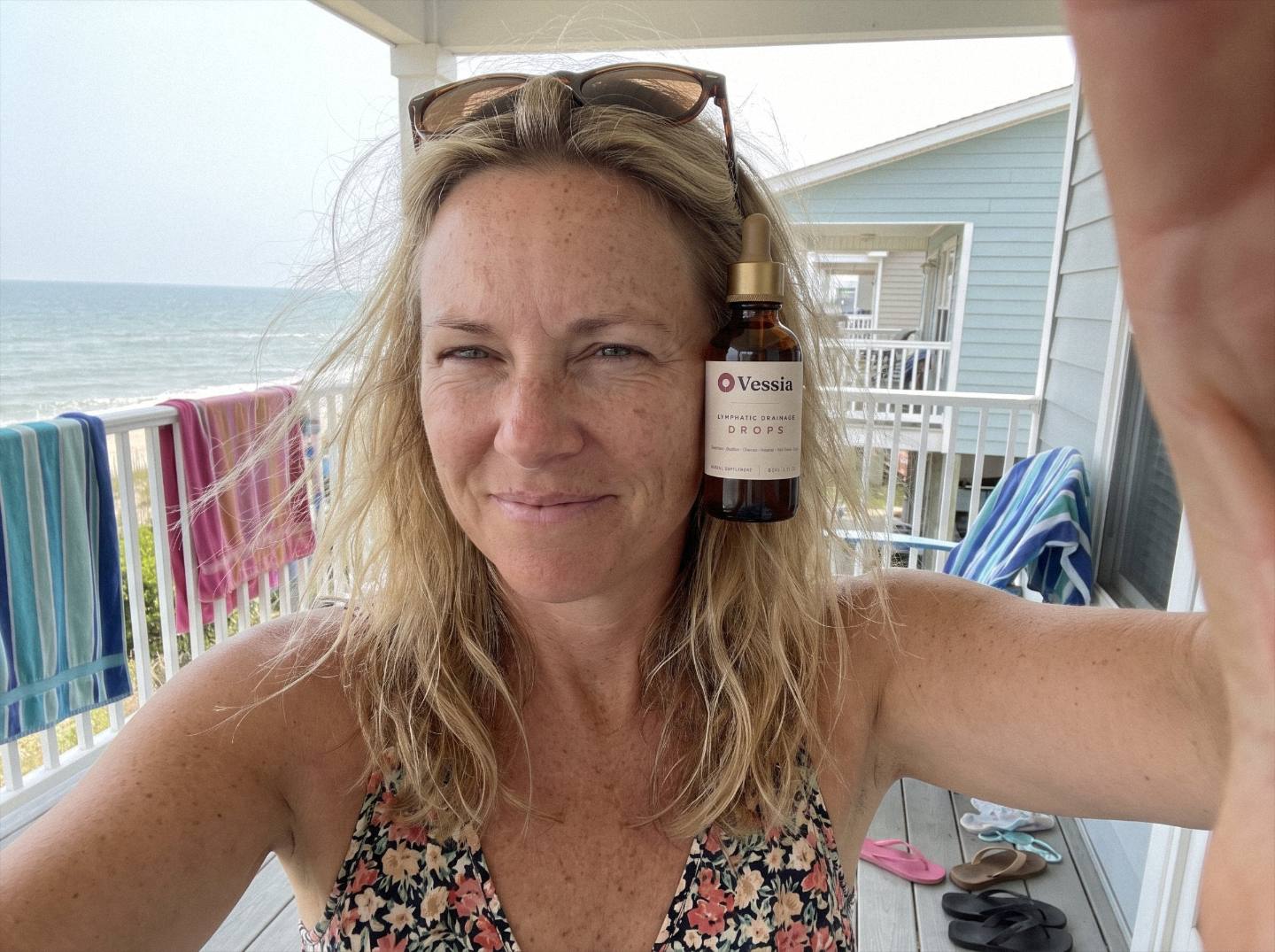 Kylie B. holding Vessia Lymphatic Drainage Drops